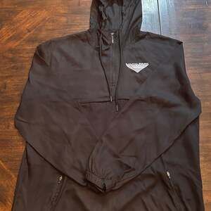 South Park Track & Field Sport-Tek Lightweight Packable Anorak Windbreaker Jacke